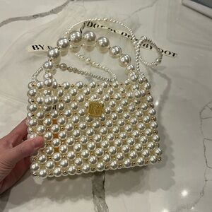 Pearl cross body and top handle bag